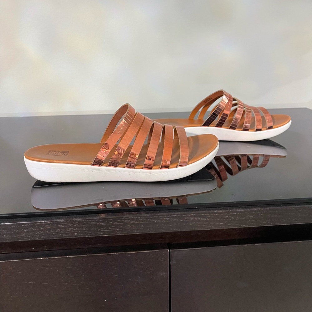 Fit flop metallic bronze slides
